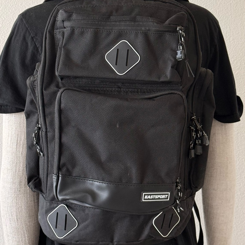 Black Urban-Style Backpack with Durable Material and Modern Design